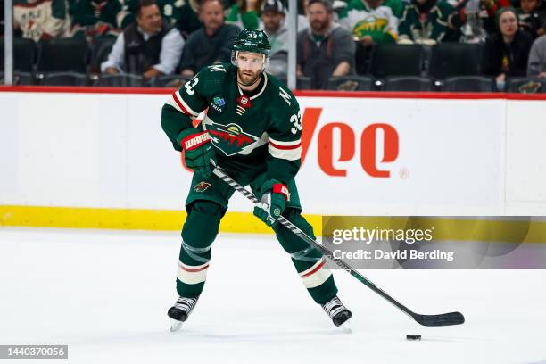 Alex Goligoski of the Minnesota Wild skates with the puck against the New York Rangers in the third period of the game at Xcel Energy Center on...