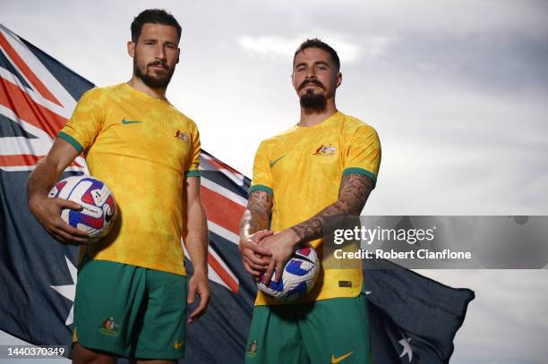 Mathew Leckie and Jamie Maclaren of Melbourne City pose in the Socceroo kit after they were named as part of the Australian 2022 FIFA World Cup...