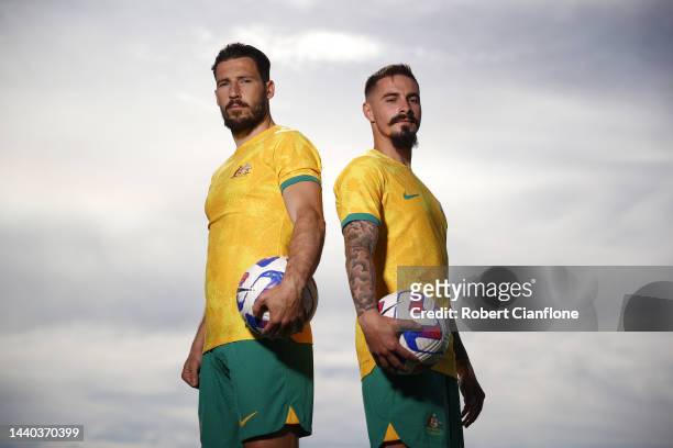 Mathew Leckie and Jamie Maclaren of Melbourne City pose in the Socceroo kit after they were named as part of the Australian 2022 FIFA World Cup...