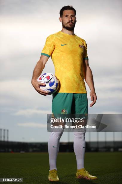 Mathew Leckie of Melbourne City poses in the Socceroo kit after he was named as part of the Australian 2022 FIFA World Cup squad, during a Melbourne...