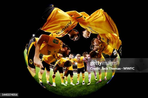 Ruben Neves of Wolverhampton Wanderers speaks to his teammates as they huddle ahead of the Carabao Cup Third Round match between Wolverhampton...