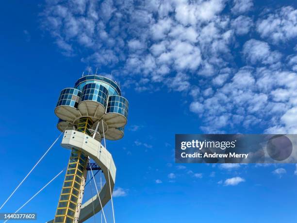 airport control tower blue sky clouds - sydney airport stock-fotos und bilder