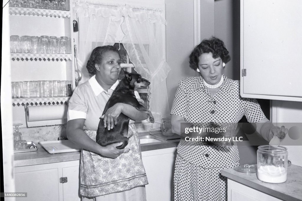 Loretta Costello , wife of mobster Frank Costello, talks to a... News