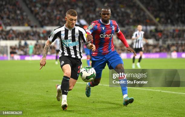 Newcastle United player Kieran Trippier is challenged by Tyrick Mitchell of Crystal Palace during the Carabao Cup Third Round match between Newcastle...