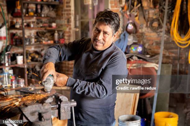 a friendly looking tradesman - tradesman real people man stock pictures, royalty-free photos & images