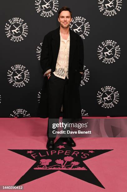 Nicholas Hoult attends the launch of Flipper's Roller Boogie Palace on November 9, 2022 in London, England.