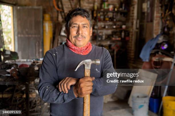 a friendly looking tradesman - tradesman real people man stock pictures, royalty-free photos & images