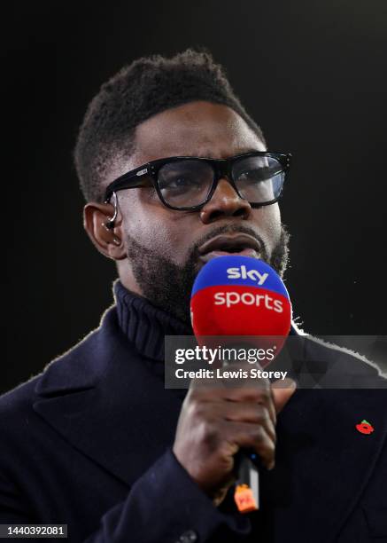 Former Footballer and TV Pundit, Micah Richards speaks during.a Sky Sports broadcast prior to the Carabao Cup Third Round match between Manchester...