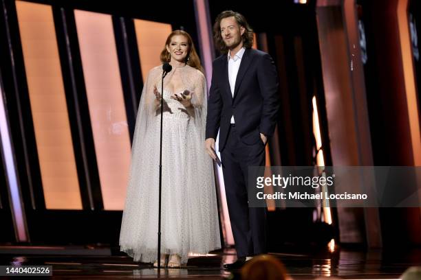Sarah Drew and Tyler Hubbard speak onstage at The 56th Annual CMA Awards at Bridgestone Arena on November 09, 2022 in Nashville, Tennessee.
