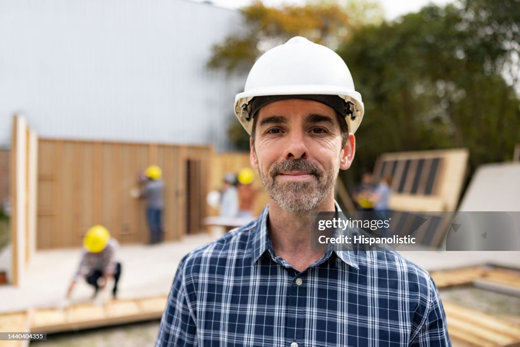 Portrait of an architect working at a construction site