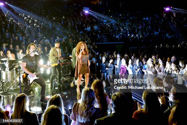 Cole Swindell and Jo Dee Messina perform onstage at The 56th Annual CMA Awards at Bridgestone Arena on November 09, 2022 in Nashville, Tennessee.