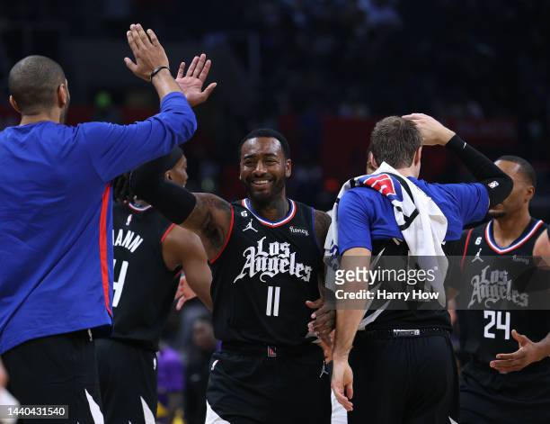 John Wall of the LA Clippers celebrate a lead over the Los Angeles Lakers during a 114-101 Clippers win at Crypto.com Arena on November 09, 2022 in...