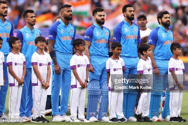 The India team sing the national anthem before play during the ICC Men's T20 World Cup Semi Final match between India and England at Adelaide Oval on...