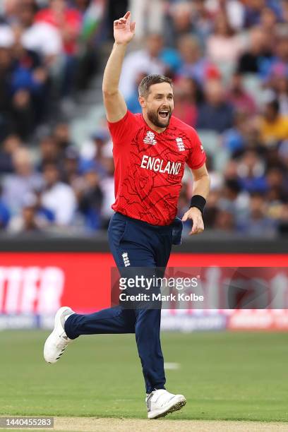 Chris Woakes of England celebrates taking the wicket of KL Rahul of India during the ICC Men's T20 World Cup Semi Final match between India and...