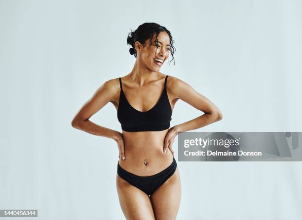 felice, donna e lingerie in uno studio per il benessere, la bellezza e la perdita di peso su un mockup a sfondo bianco. salute, donna nera e modello di biancheria intima in posa, ridendo e sentendosi sicuro mock up - parte del corpo umano foto e immagini stock