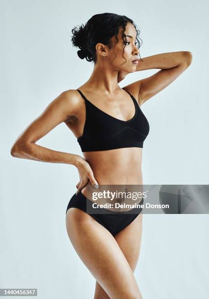 woman, body and healthy lifestyle looking slim for fitness, exercise or diet mockup against studio background. female model posing for beauty, sports and motivation for flat stomach after weight loss - body stock pictures, royalty-free photos & images