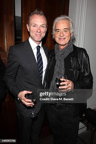 Gary Kemp and Jimmy Page attend a party to launch the book "Speed of Life," containing photographs of David Bowie, by Masayoshi Sukita at the Arts...