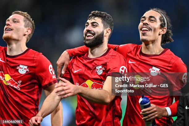 Marcel Halstenberg, Josko Gvardiol and Yussuf Poulsen of RB Leipzig celebrates victory after the Bundesliga match between TSG Hoffenheim and RB...