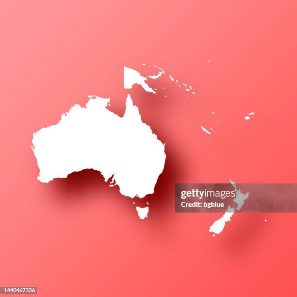 oceania map on red background with shadow - australasia stock illustrations