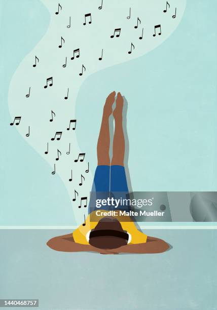 stockillustraties, clipart, cartoons en iconen met woman relaxing, listening to music with headphones and legs up the wall - luisteren