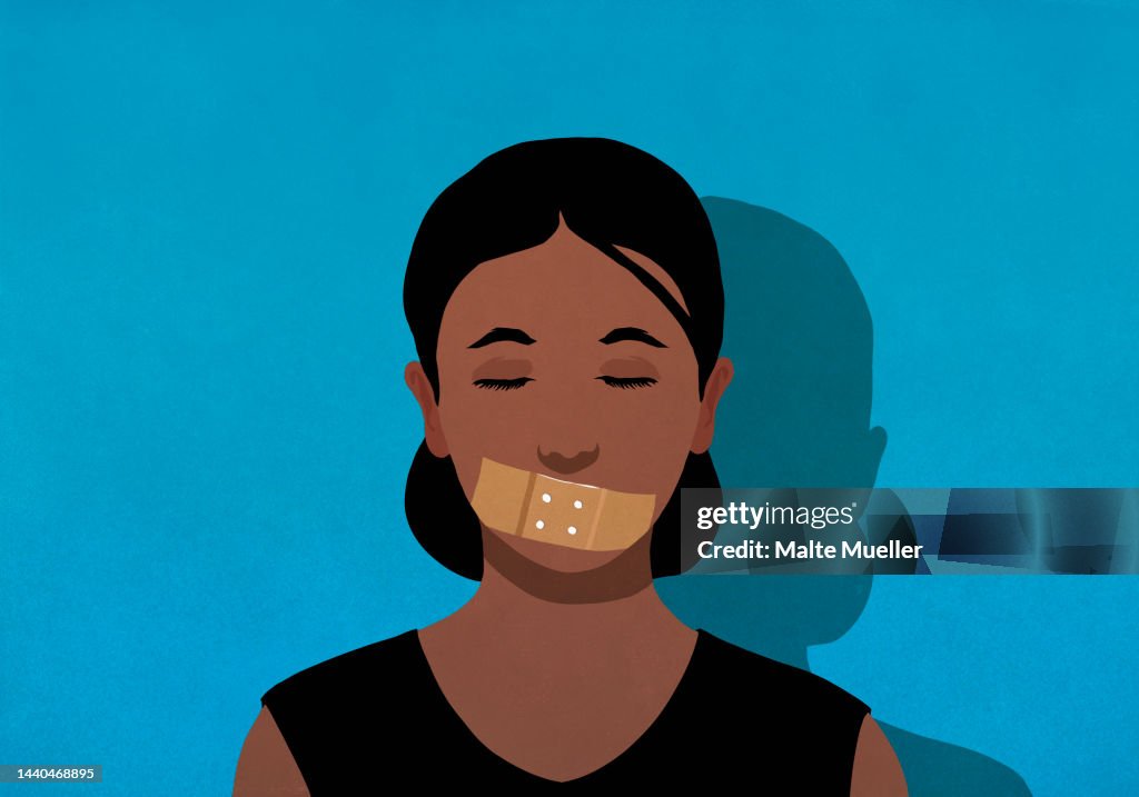 Large bandage covering mouth of woman with eyes closed