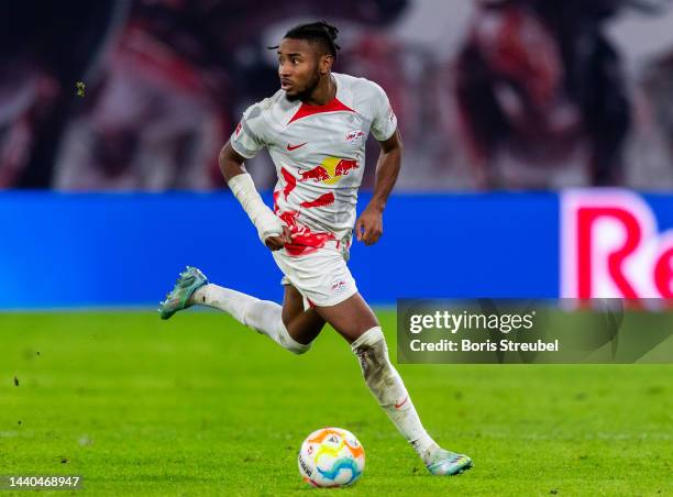 Christopher Nkunku of RB Leipzig runs with the ball during the Bundesliga match between RB Leipzig and Sport-Club Freiburg at Red Bull Arena on...