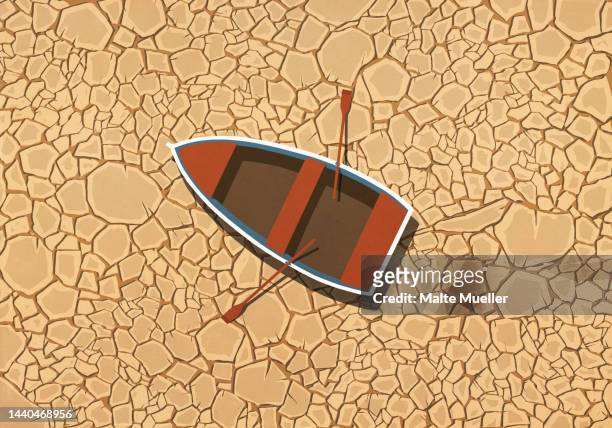 abandoned rowboat stranded on dry, cracked land - arid climate stock illustrations