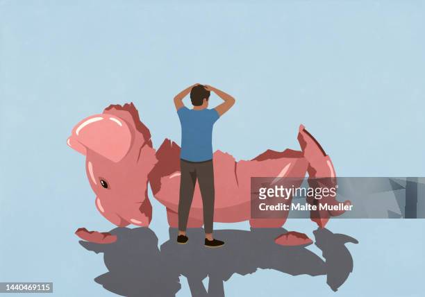 ilustrações de stock, clip art, desenhos animados e ícones de stressed man looking at broken piggy bank - recessão