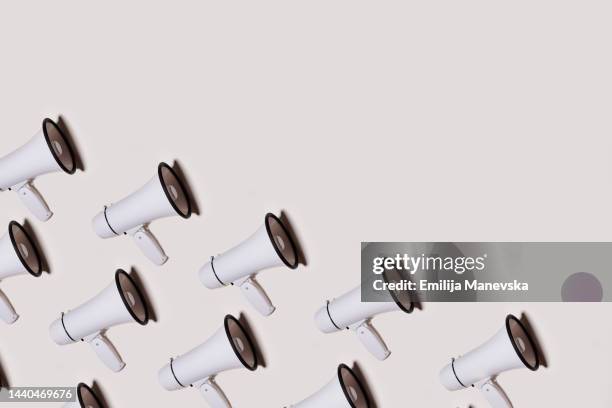 white megaphone with copy space - horn press stock pictures, royalty-free photos & images