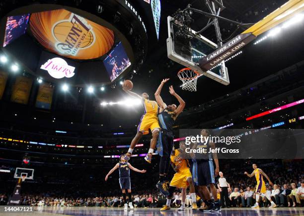 Ramon Sessions of the Los Angeles Lakers shoots the ball over JaVale McGee of the Denver Nuggets in the first half in Game Five of the Western...