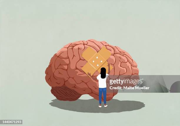 woman placing bandage on brain injury - fear illustration stock illustrations