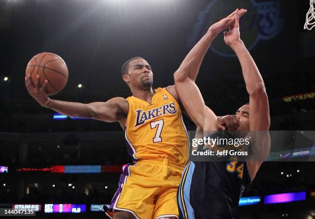 Ramon Sessions of the Los Angeles Lakers shoots the ball over JaVale McGee of the Denver Nuggets in the first half in Game Five of the Western...