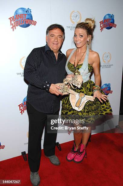 Robert Earl and Angel Porrino arrive at the Planet Hollywood Restaurant grand opening at The Forum Shops at Caesars on May 8, 2012 in Las Vegas,...