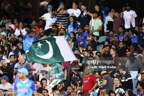 Supporter in the crowd waves a Pakistan flag during the ICC Men's T20 World Cup Semi Final match between India and England at Adelaide Oval on...