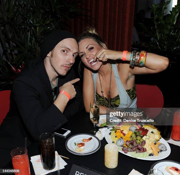 Tony Hernandez and Angel Porrino attend the grand opening of the Planet Hollywood restaurant in The Forum Shops at Caesars on May 8, 2012 in Las...