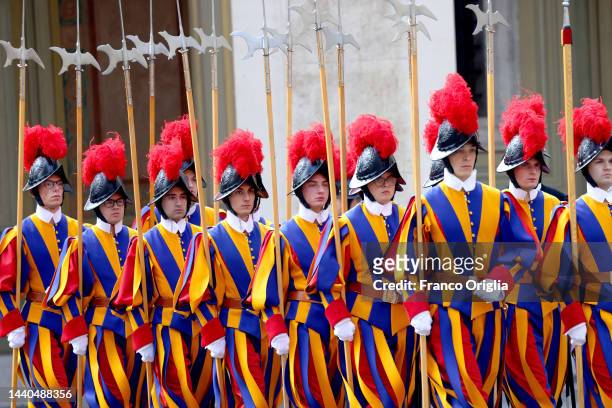 Swiss guards arrive at the San Damaso Courtyard for the arrival of King Abdullah II of Jordan and Queen Rania during an audience of Pope Francis on...