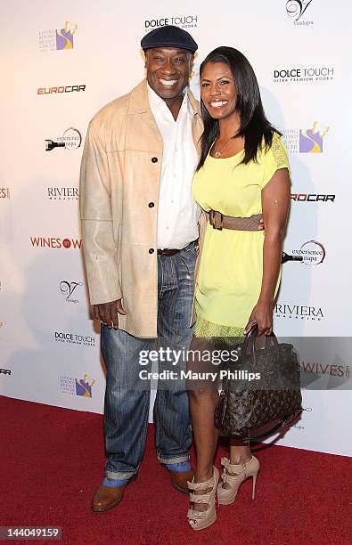 Michael Clarke Duncan and Omarosa Manigault-Stallworth arrive at Wines By Wives Launch Party For Celebrity Wine Of The Month Club at Lexington Social...