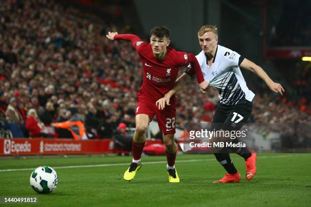 Calvin Ramsey of Liverpool and Louie Sibley of Derby during the Carabao Cup Third Round match between Liverpool and Derby County at Anfield on...