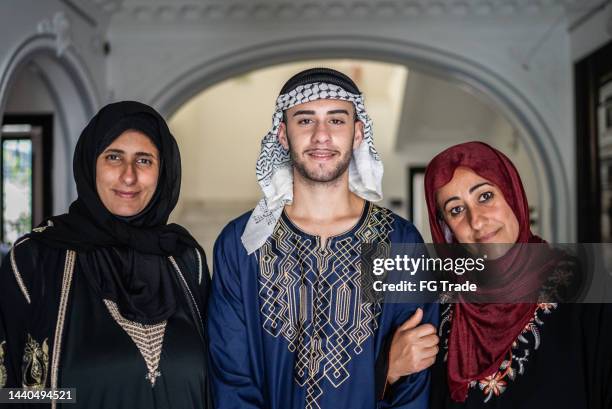 portrait of a arab family at home - aunyy stock pictures, royalty-free photos & images