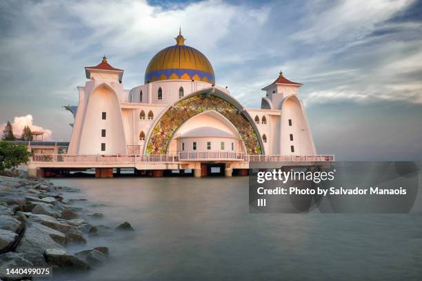 dusk at melaka's masjid selat (malacca straits mosque) - malaysia architecture stock pictures, royalty-free photos & images