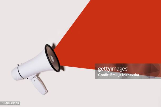white megaphone with copy space - insegna commerciale foto e immagini stock