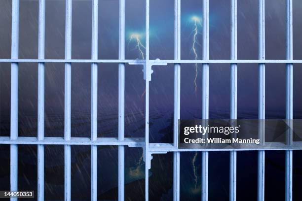 storm outside prison bars - prison bars isolated stock illustrations