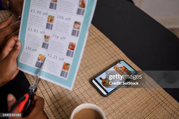 cutting out coupons - coupon stock pictures, royalty-free photos & images