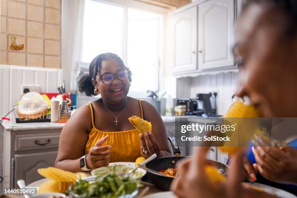 a sister date - family eating stock pictures, royalty-free photos & images