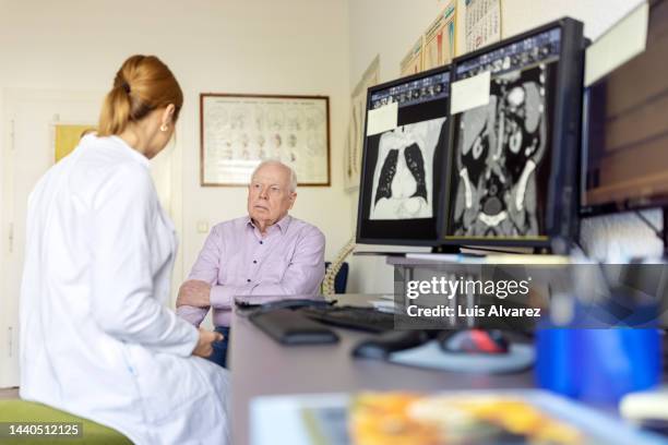 senior woman visiting neurologist for medical checkup - nervous system stock pictures, royalty-free photos & images