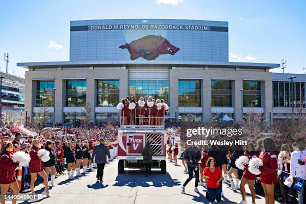 View outside the stadium as the Arkansas Razorbacks walk to the stadium before a game against the Liberty Flames at Donald W. Reynolds Razorback...