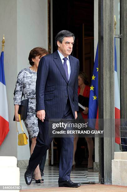 France's Prime Minister Francois Fillon, leaves the Elysee presidential palace, on May 9, 2012 in Paris, at the end of the last weekly cabinet...