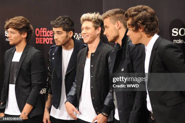 One Direction band members Louis Tomlinson, Zayn Malik, Niall Horan, Liam Payne and Harry Styles attend the "One Direction: This Is Us" New York...