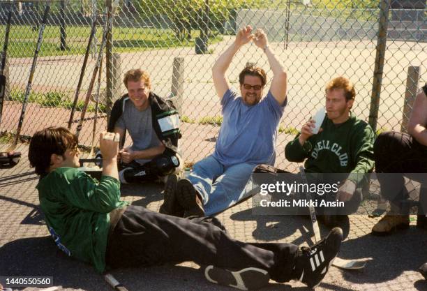 View of, from fore left, actors Jason Barry and Noah Emmerich , film director Ted Demme , and actor Denis Leary during the filming of 'Monument Ave'...