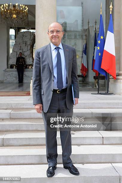 French Foreign Minister Alain Juppe leaves the weekly cabinet meeting at Elysee Palace on May 9, 2012 in Paris, France.